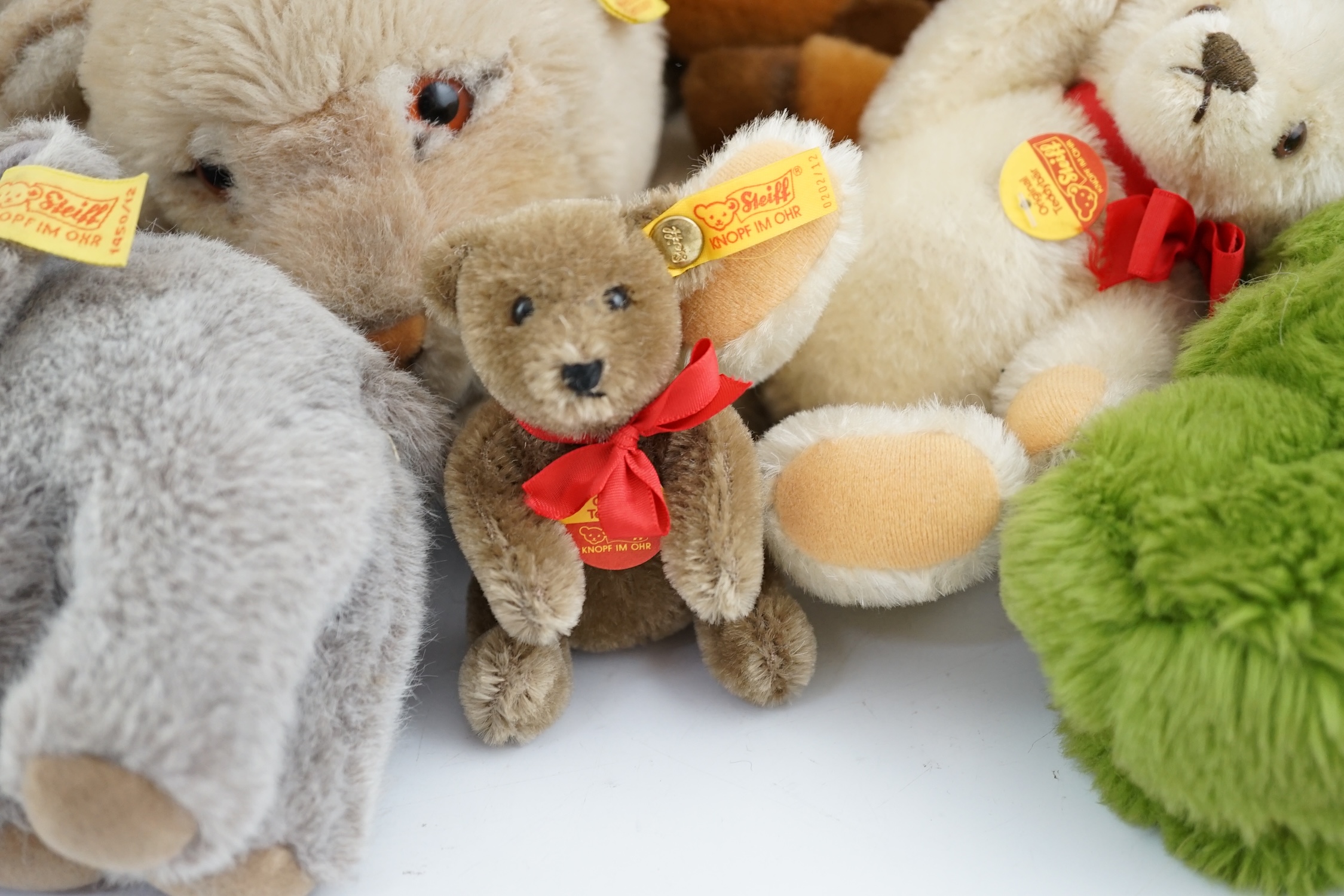 Ten assorted Steiff yellow tag animals, two yellow tag bears, together with Steiff catalogues